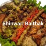 A delicious platter of grilled meats and vegetables served at Shinwari Baithak, showcasing their rich BBQ offerings. This dish is a part of the Shinwari Baithak menu, a popular choice for South Islamabad eats, featuring traditional Afghan and Pakistani flavors."
