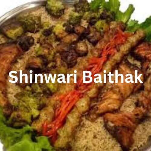 A delicious platter of grilled meats and vegetables served at Shinwari Baithak, showcasing their rich BBQ offerings. This dish is a part of the Shinwari Baithak menu, a popular choice for South Islamabad eats, featuring traditional Afghan and Pakistani flavors."