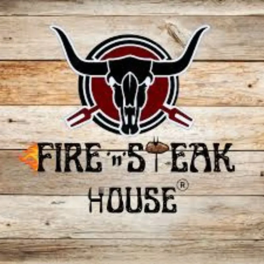 Fire 'n' Steak House logo with a rustic wooden background, offering a fiery dining experience for steak lovers. Featured on South Islamabad Eats, this restaurant is known for its delicious steaks and inviting atmosphere.
