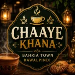 Richly designed circular logo for “Chaaye Khana – Bahria Town Rawalpindi,” featuring a steaming teacup, ornate gold accents, warm café background, and centered text for mobile-friendly display.